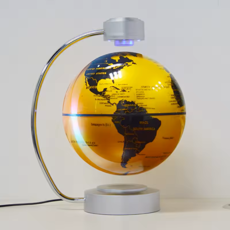 Globe terrestre lumineux design jaune or avec éclairage LED et support moderne